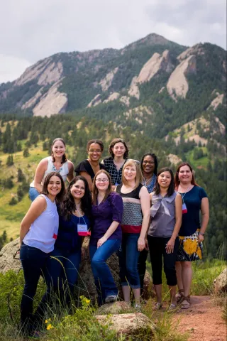 SOARS students pose in front of the Flatirons.